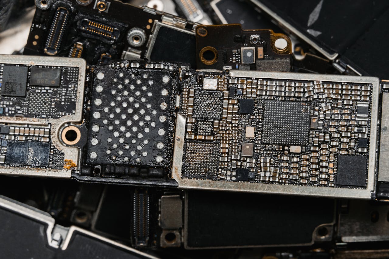 services-02 Detailed image of electronic circuit board components, showcasing intricate engineering.