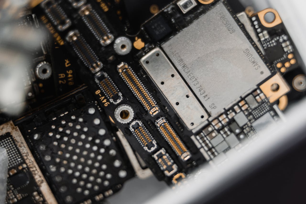 Detailed view of electronic components on a circuit board for maintenance.